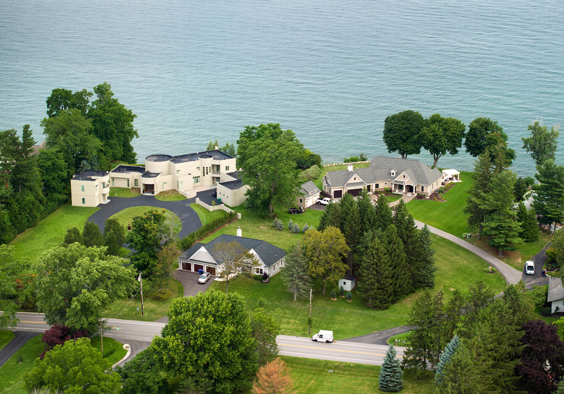 Upscale suburban homes on lake Ontario waterfront area in Rochester, NY. Private residential houses in rural suburban sprawl in upstate New York